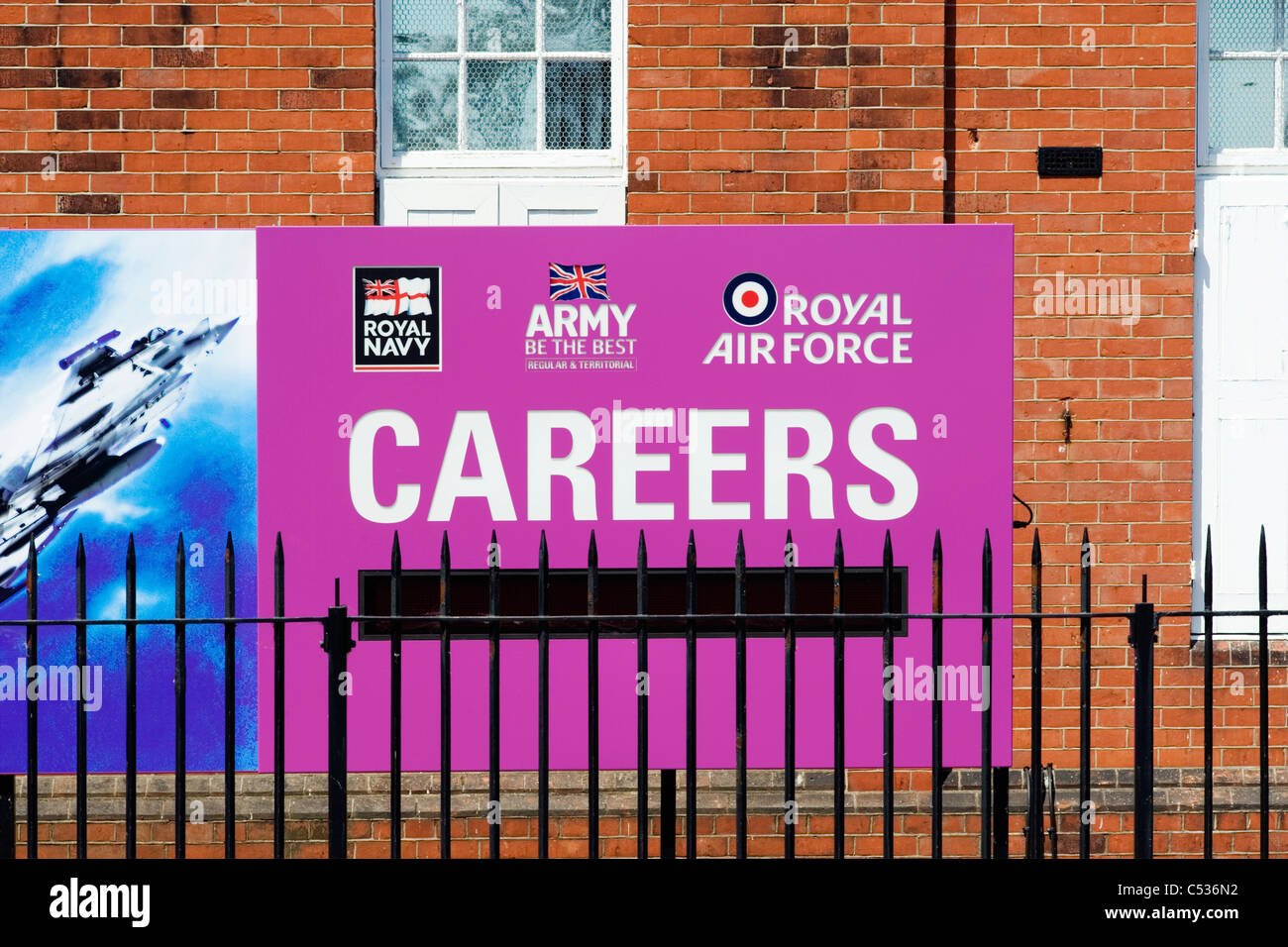 Emblems For The Three Armed Forces At A Military Recruitment Center In