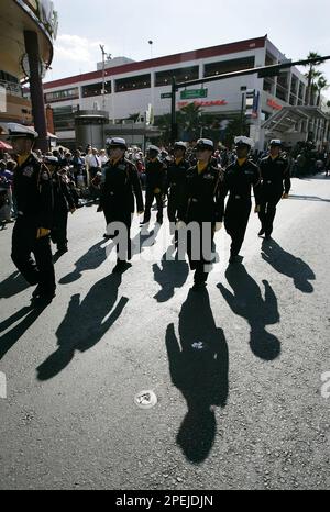 High School Rotc Students March In The Annual Ragamuffin Parade In Bay