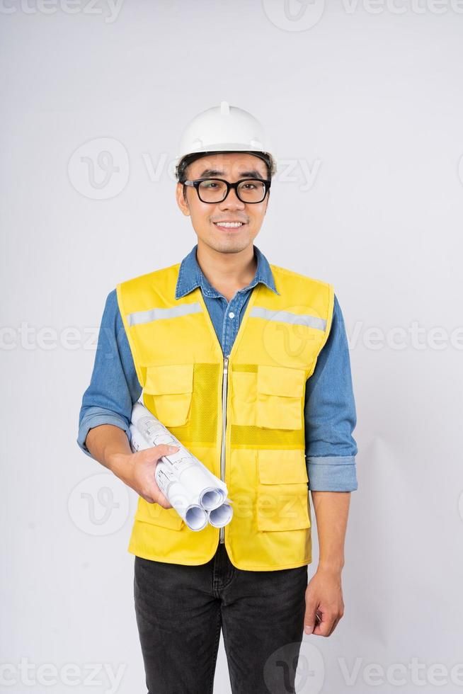 Smiling Young Asian Civil Engineer Wearing Helmet Hard Hat Standing On