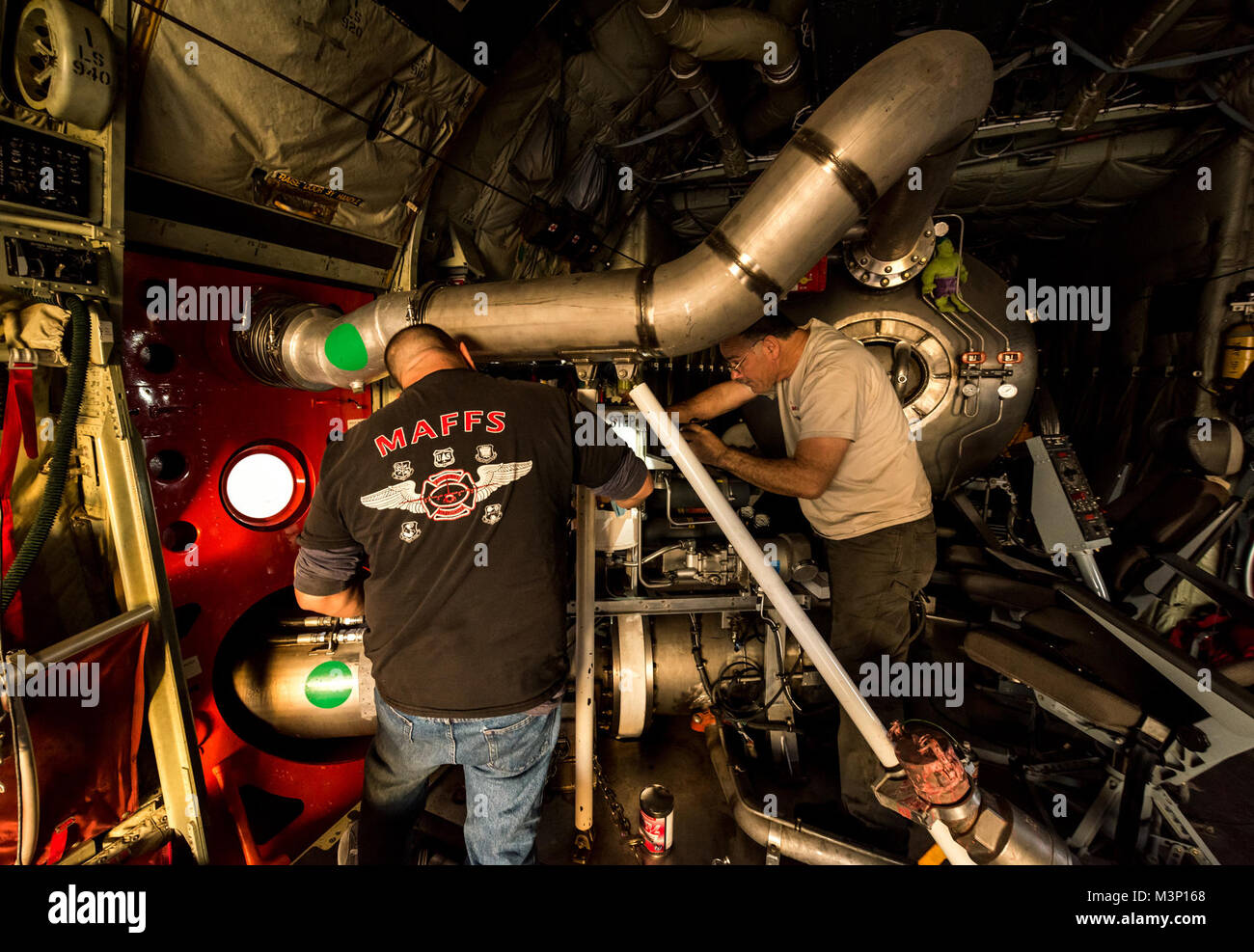 Technicians Perform A Test On A Modular Airborne Fire Fighting System