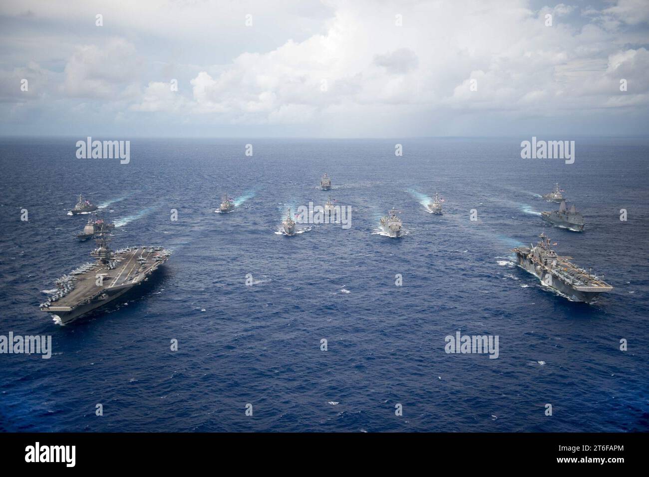 The Aircraft Carrier Uss Ronald Reagan Leads A Formation Of Ships Assigned To Carrier Strike